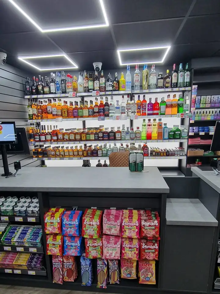 Shop till counter with back-counter display shelving