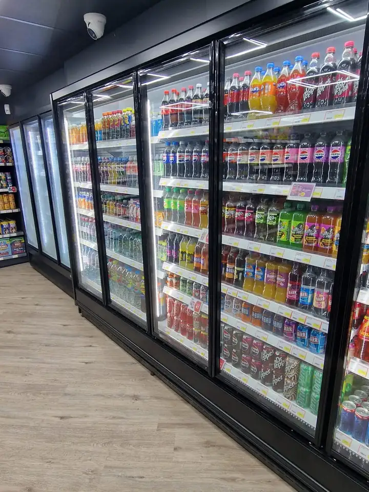 Glass door display fridges installed in a convenience store